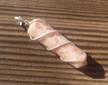 Load image into Gallery viewer, SUNSTONE Spiral Wire Wrapped Pencil Point Pendant Gemstone