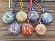Load image into Gallery viewer, 7 CHAKRA Gemstone Engraved Disk Pendant Set With Cords
